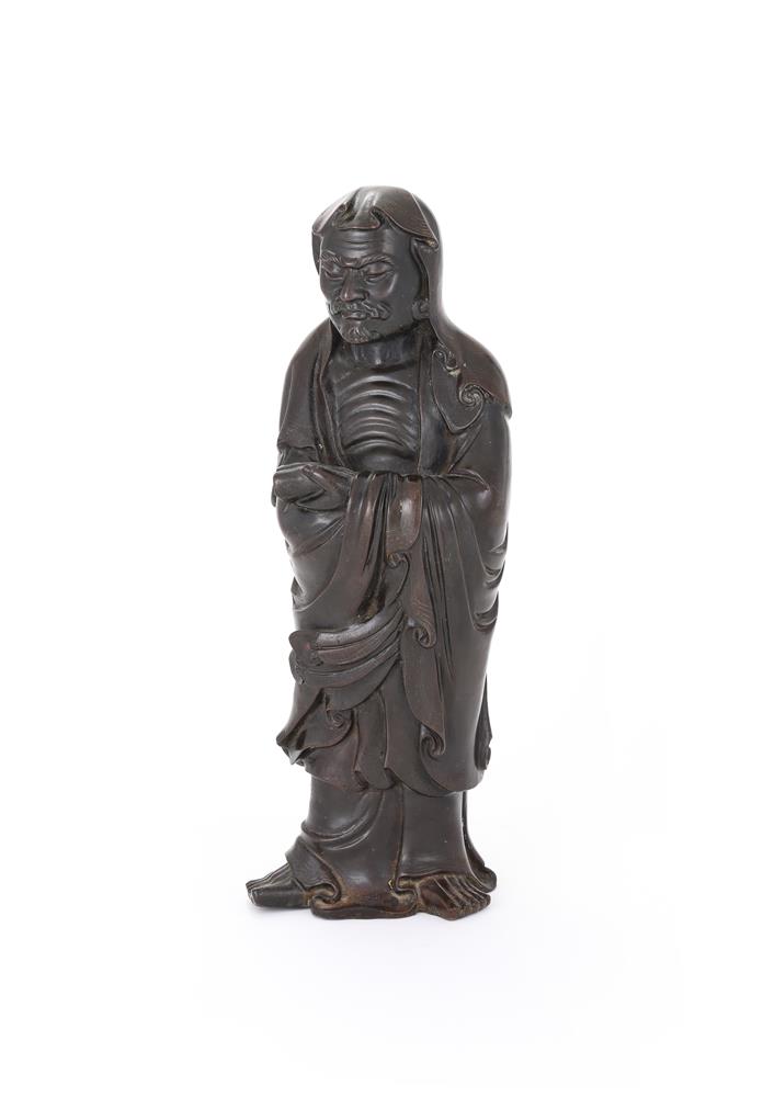 A Chinese silver inlaid bronze figure of Damo