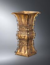 A Chinese gilt bronze Gu-shaped vase