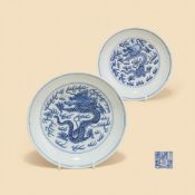 Two similar Chinese blue and white 'dragon' dishes