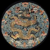 A Chinese Imperial silk embroidered 'dragon' roundel