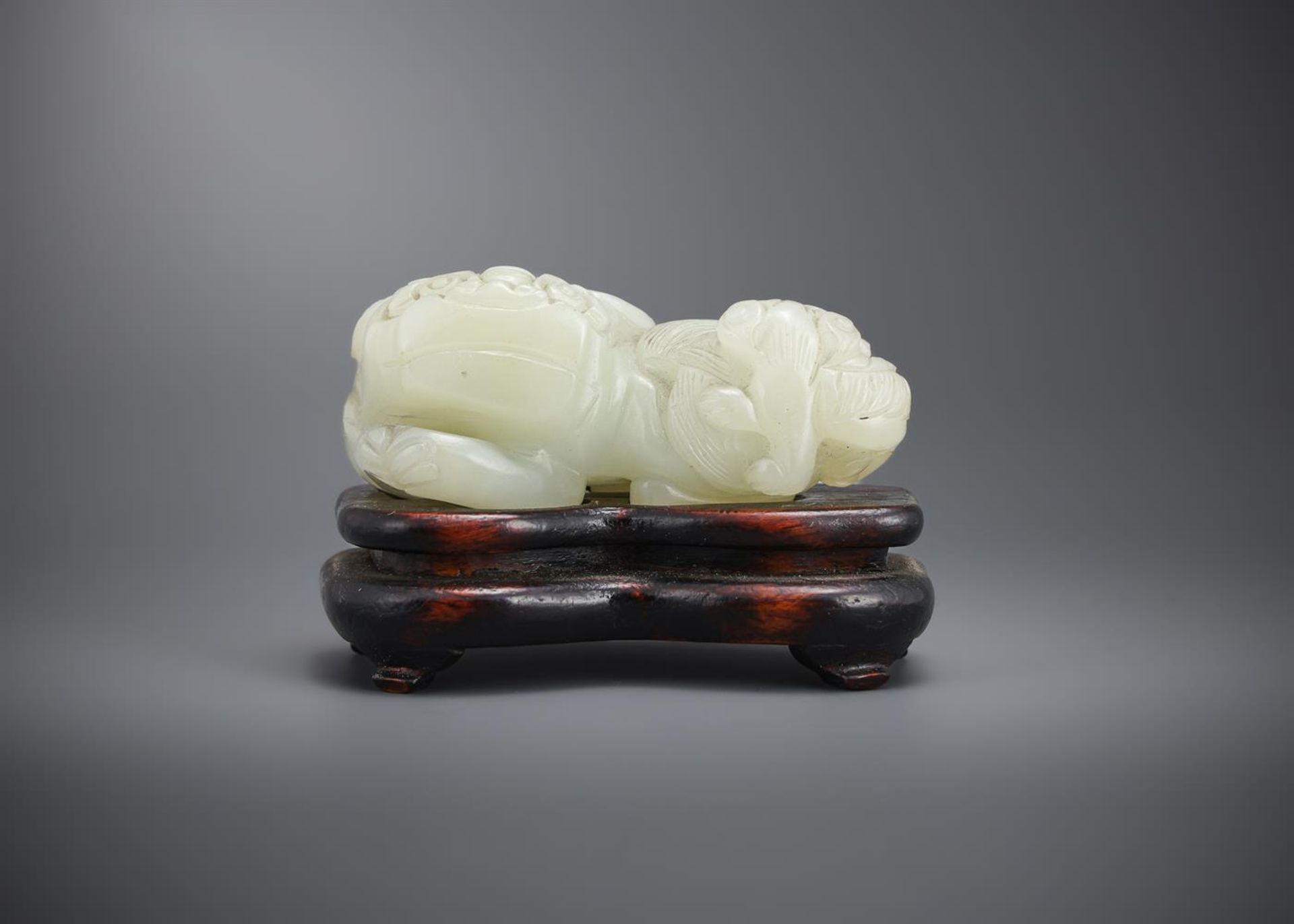 A Chinese pale celadon or white jade lion - Image 2 of 5