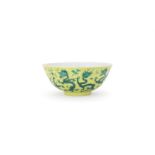 A Chinese yellow-ground green enamelled 'Dragon' bowl