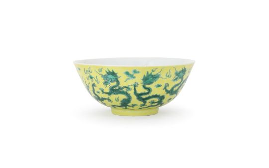 A Chinese yellow-ground green enamelled 'Dragon' bowl