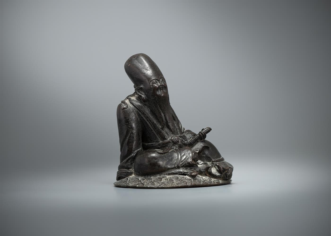 A Chinese bronze figure of shoulao