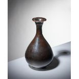 A Chinese black-glazed pottery vase