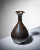 A Chinese black-glazed pottery vase