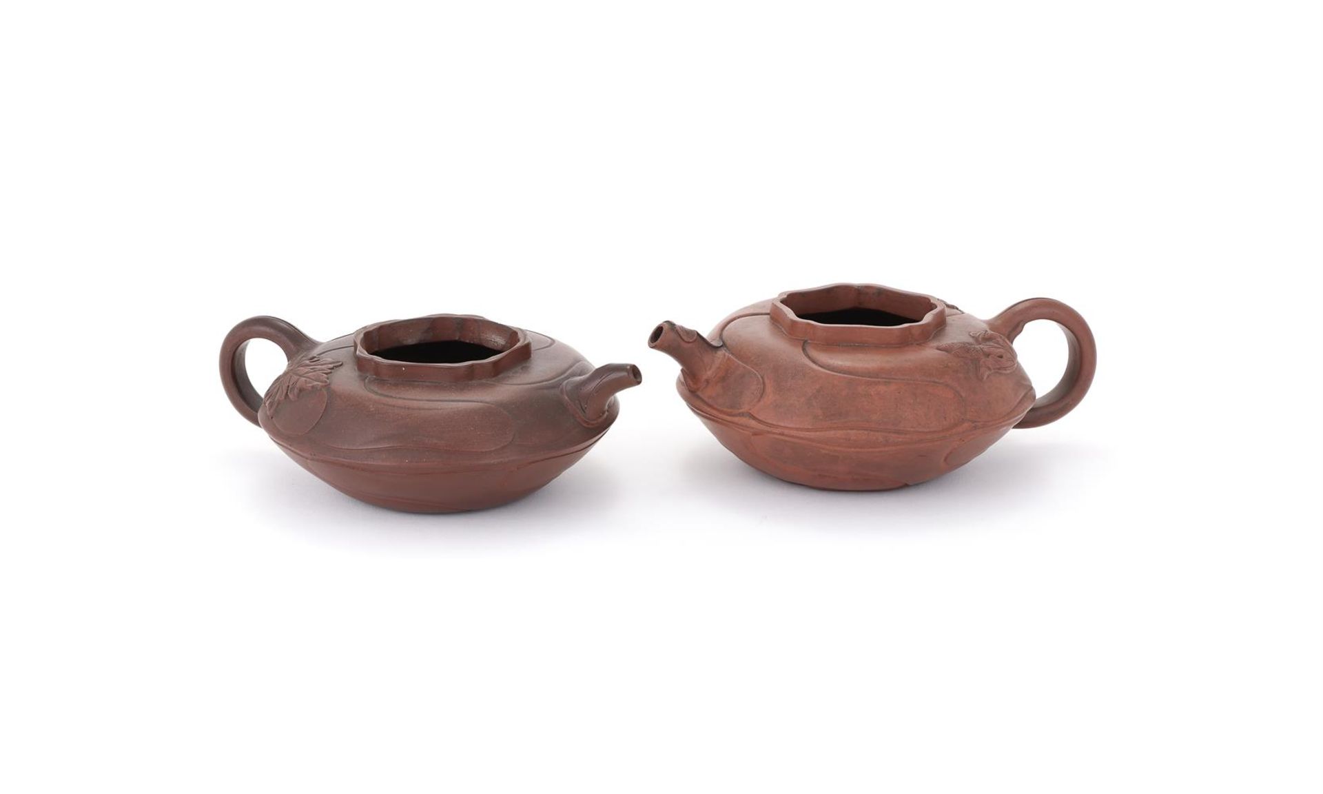 A pair of Yixing lobed teapots