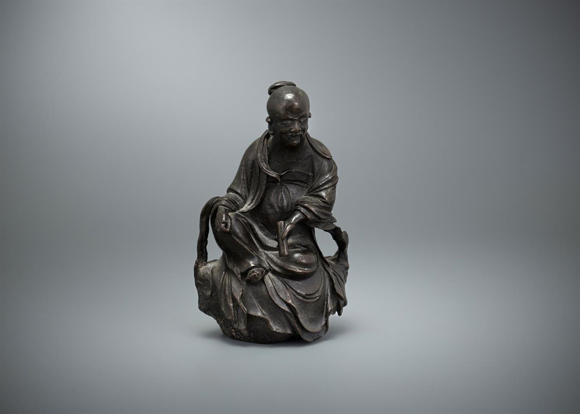A Chinese bronze figure of Lao Zi