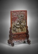 A Chinese Qiyang soapstone 'landscape' table screen