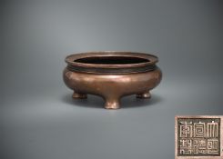 A Chinese tripod bronze censer