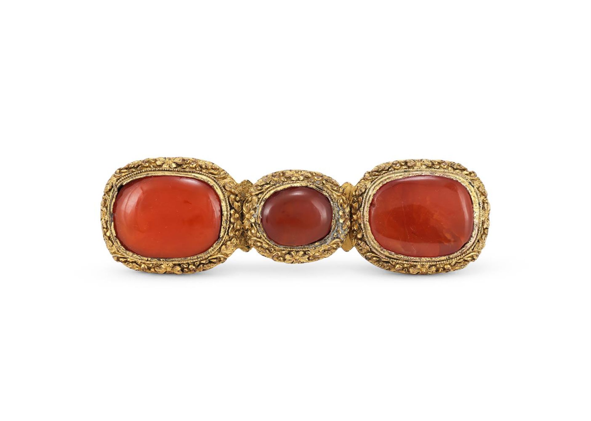 A Chinese gilt-bronze mounted carnelian agate buckle
