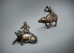 A Chinese bronze 'buffalo and rider' paper weight