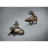 A Chinese bronze 'buffalo and rider' paper weight
