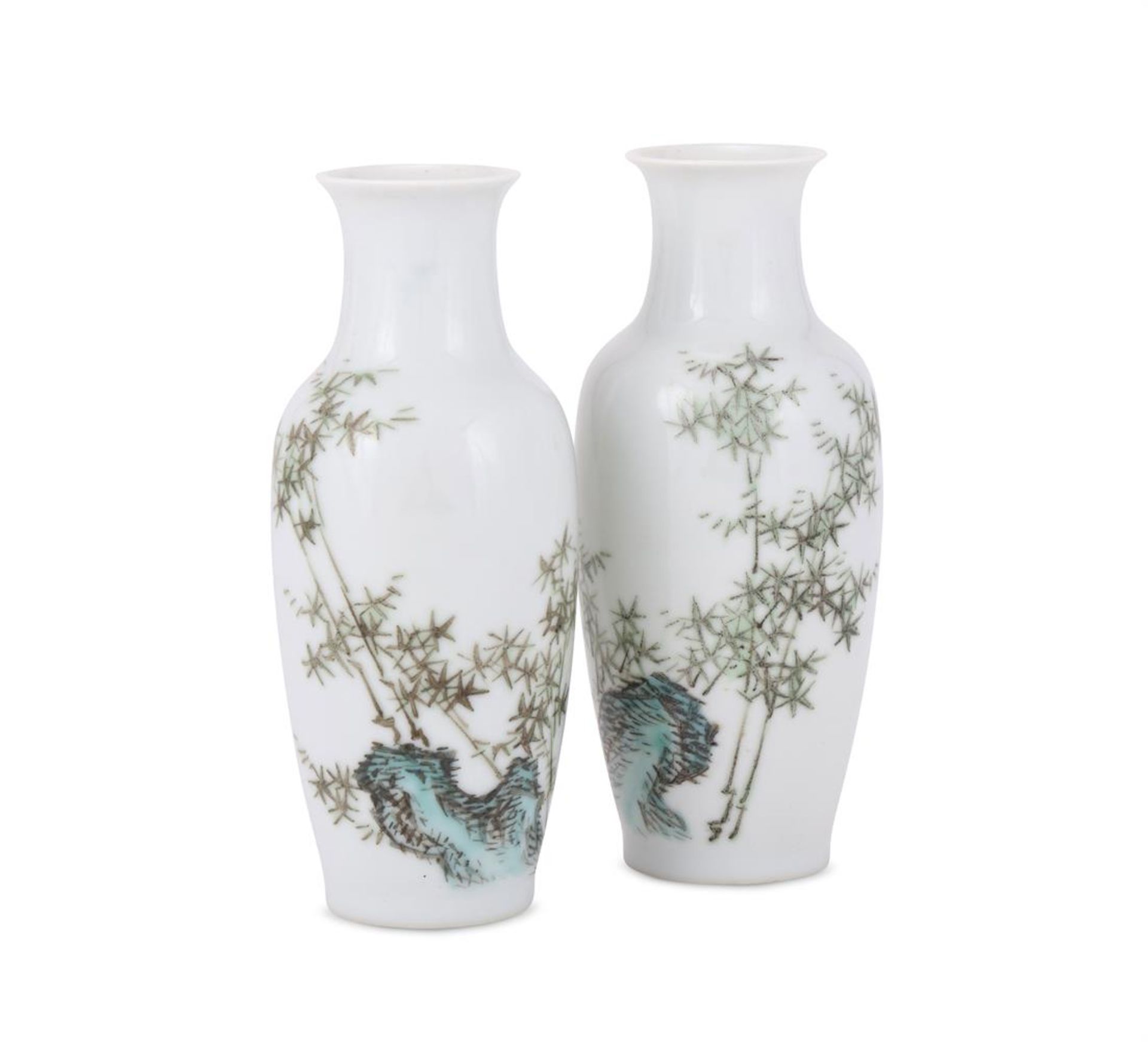 A pair of Chinese enamelled small vases