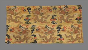 A Chinese yellow silk brocade 'Dragon' panel