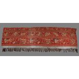 A large Chiense red-ground 'Dragons and phoenixes' wall hanging