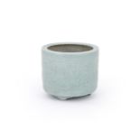 A Chinese celadon glazed 'peony' censer