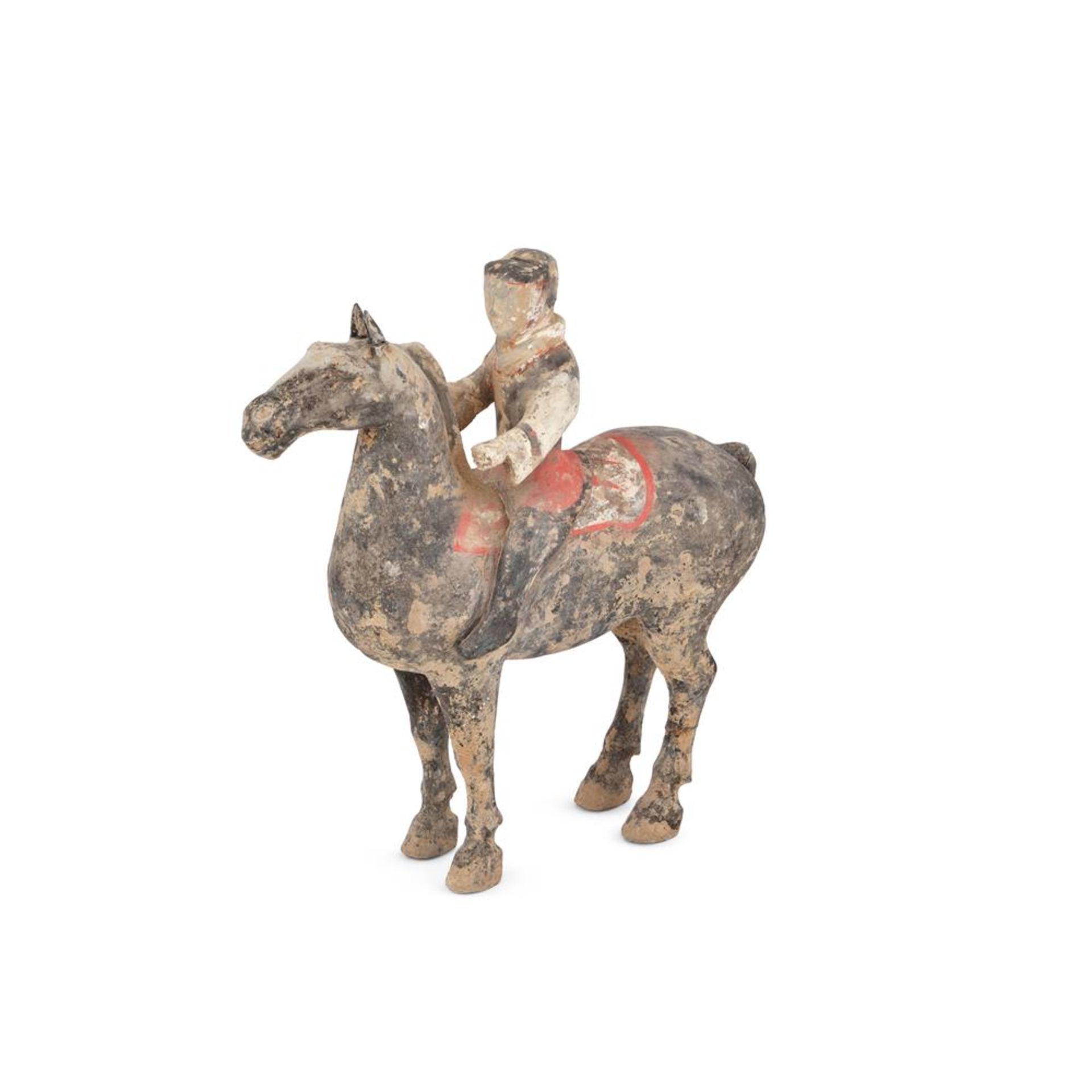 A Chinese painted pottery horse and rider