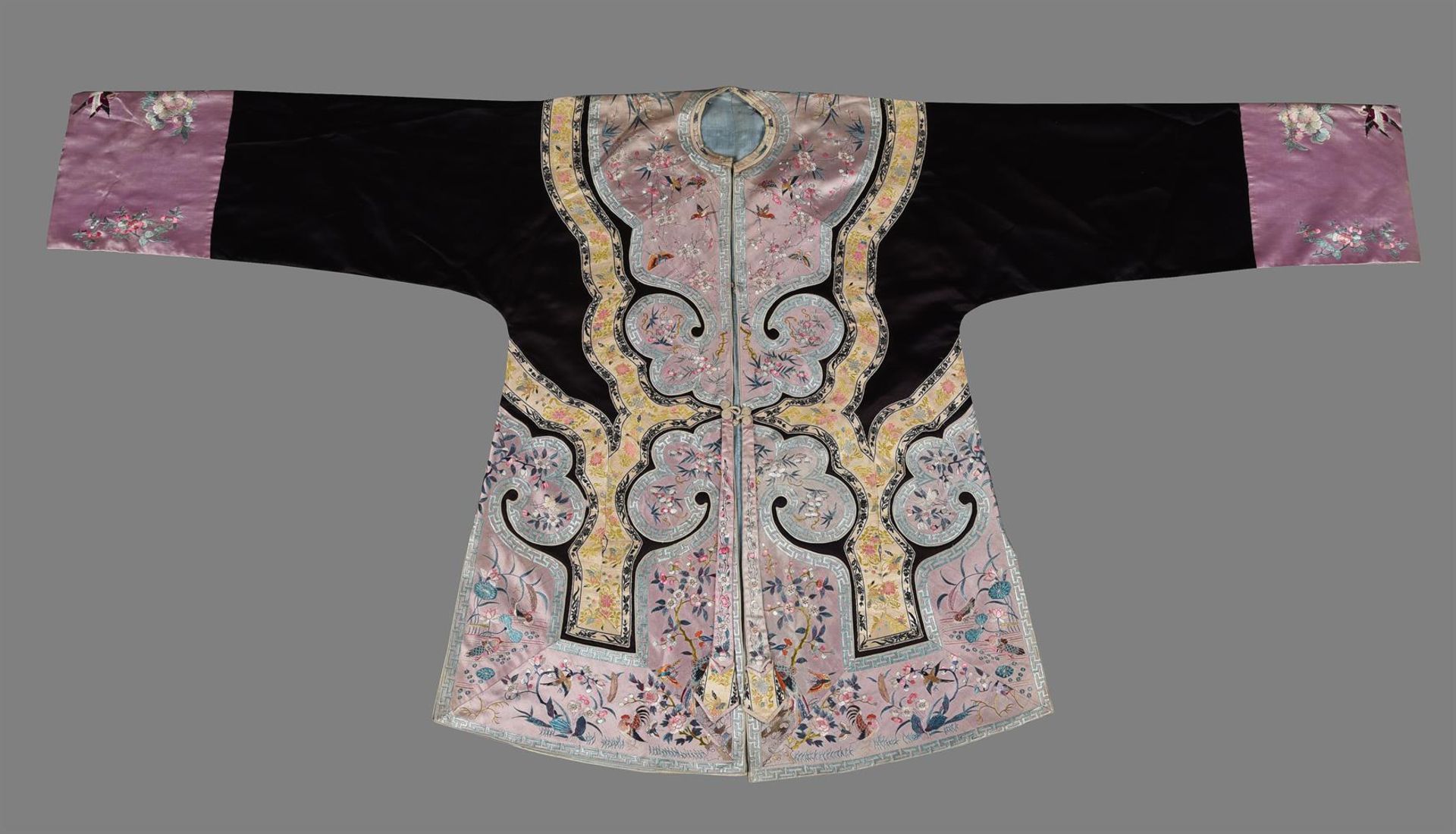 A Chinese embroidered silk short jacket