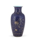 A Chinese underglaze blue and gilt vase