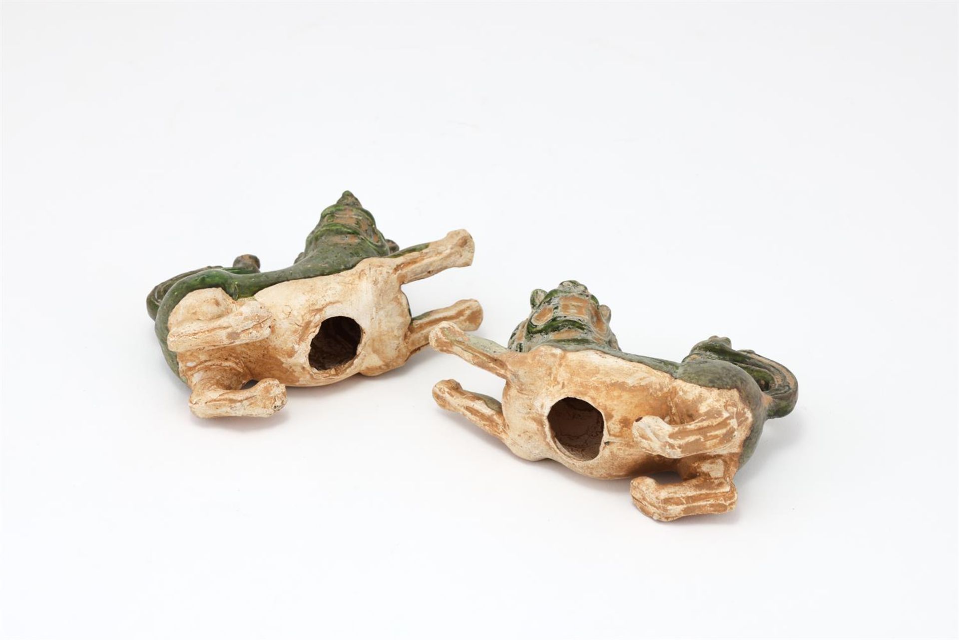 A pair of Chinese green glazed models of lions - Image 4 of 4