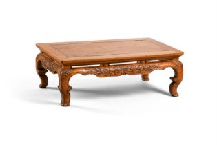 A Chinese carved fruitwood Kang Table