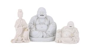 A Chinese Dehua seated figure of Budai