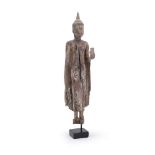 A carved and painted wood figure of Buddha