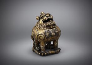 A Chinese gilt-bronze Luduan-form censer