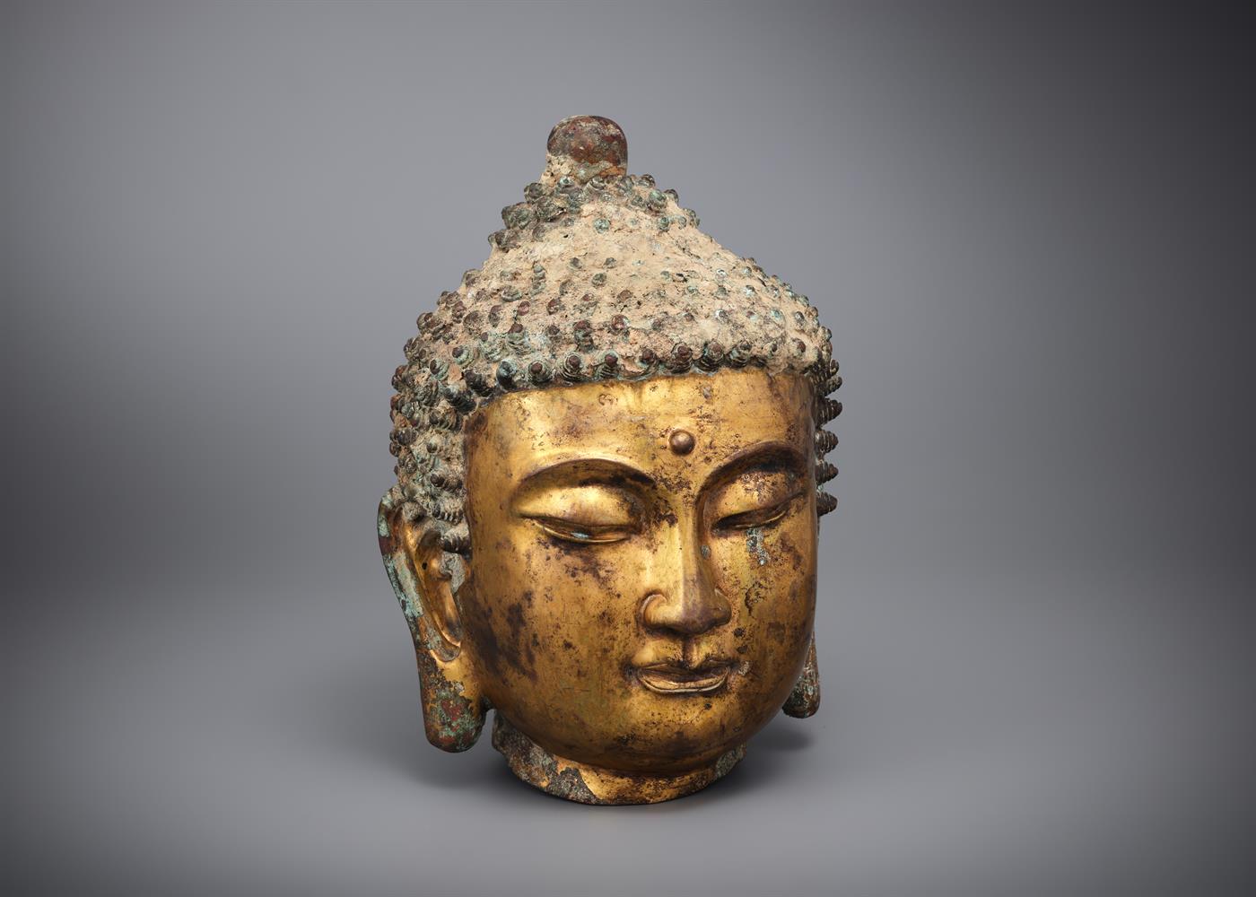 A Chinese gilt-bronze Buddha head