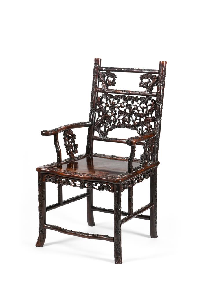 A Chinese carved hongmu armchair