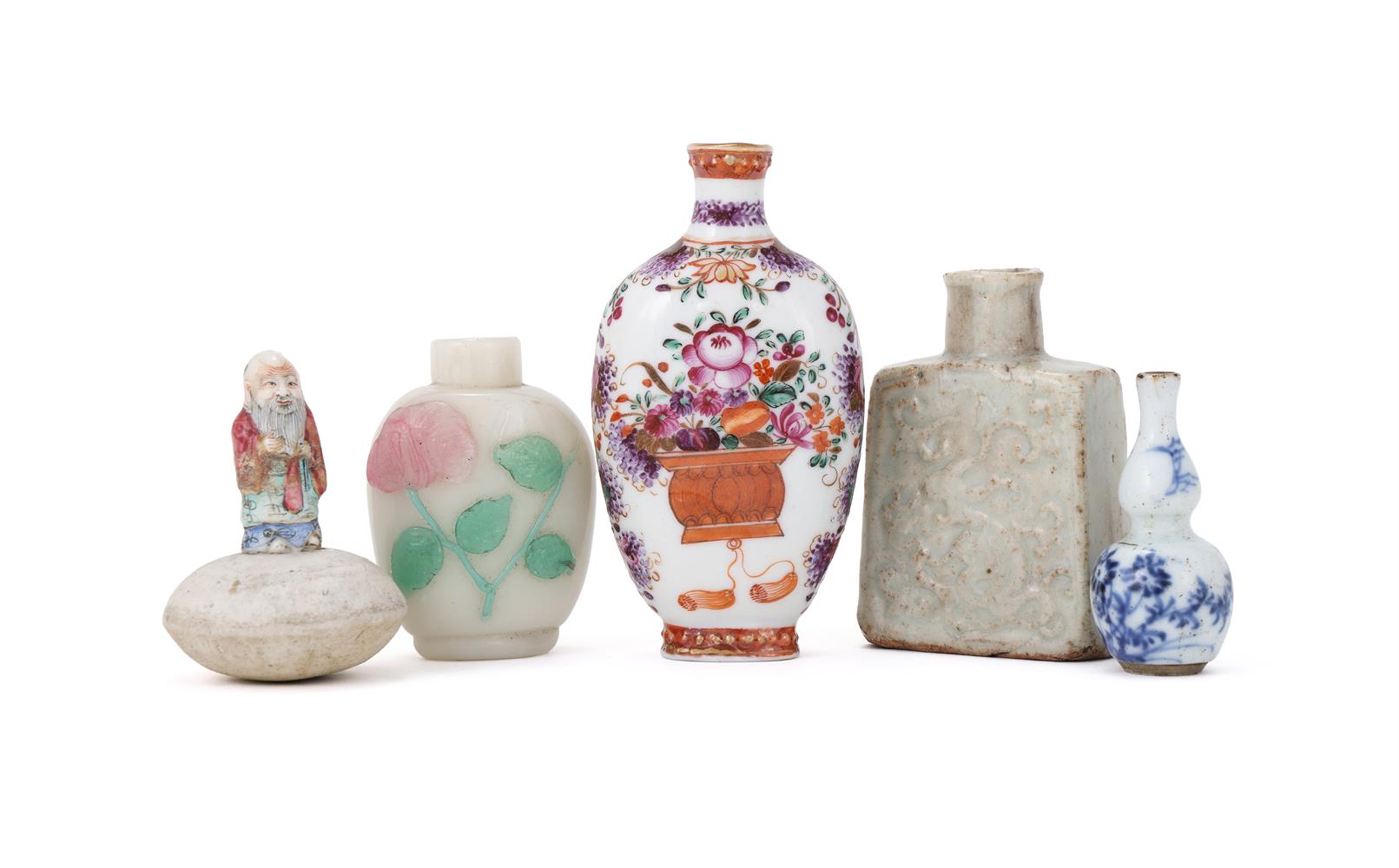 A group of assorted Chinese snuff bottles and one miniature porcelain figure