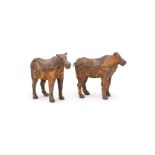 A pair of Chinese iron models of oxen