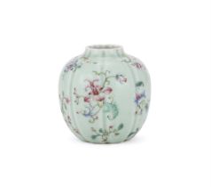 A Chinese celadon-ground Famille Rose vase