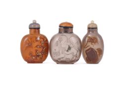 A Chinese smoky-agate snuff bottle and stopper