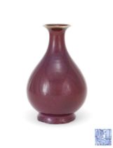 A Chinese flambe glazed vase