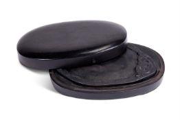 A Chinese zitan cased duan ink stone