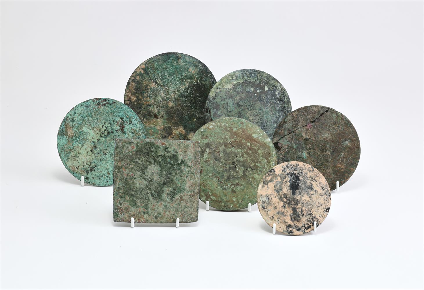 A group of seven Chinese bronze mirrors - Image 2 of 2
