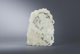 A Chinese pale celadon plaque of He-He Erxian