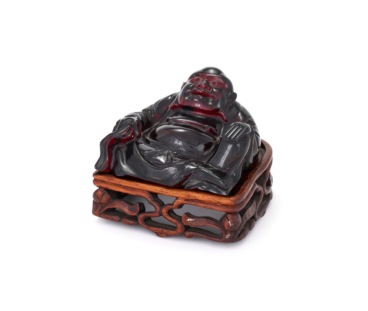 A Chinese resin model of a seated Buddha