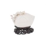 A Chinese white glaze 'Lotus and dragon' water dropper