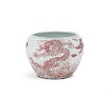 A large Chinese blue and white and underglaze red 'Dragon' jardinière