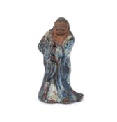 A Chinese Shiwan-glazed figure of Damo