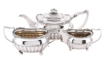 Y A GEORGE III SILVER HALF LOBED OBLONG BALUSTER THREE PIECE TEA SET