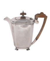 A SILVER OCTAGONAL HOT WATER POT