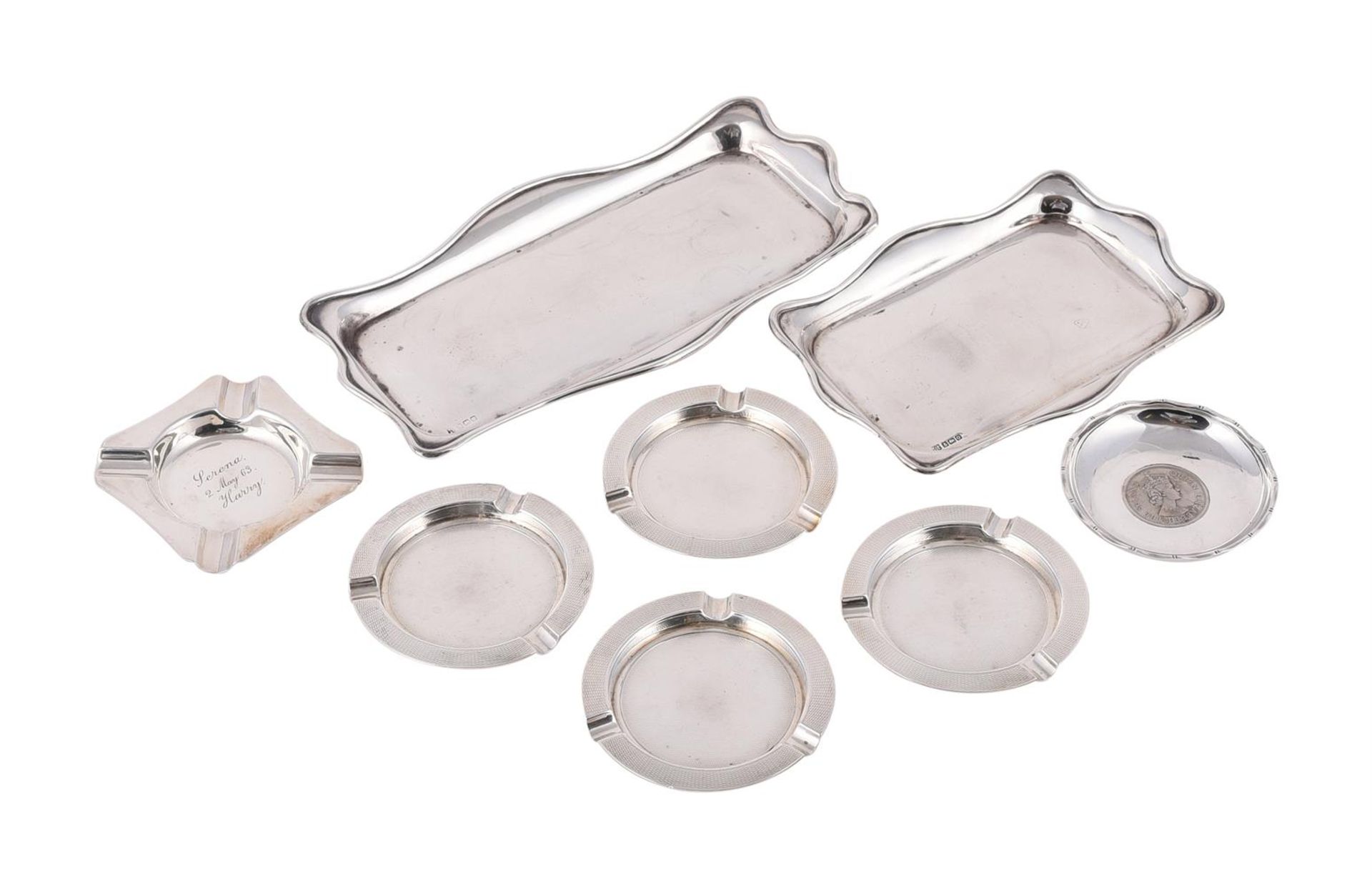 A COLLECTION OF SILVER TRAYS