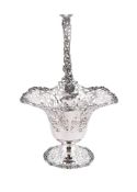 A SILVER SWING HANDLED AND PIERCED BASKET