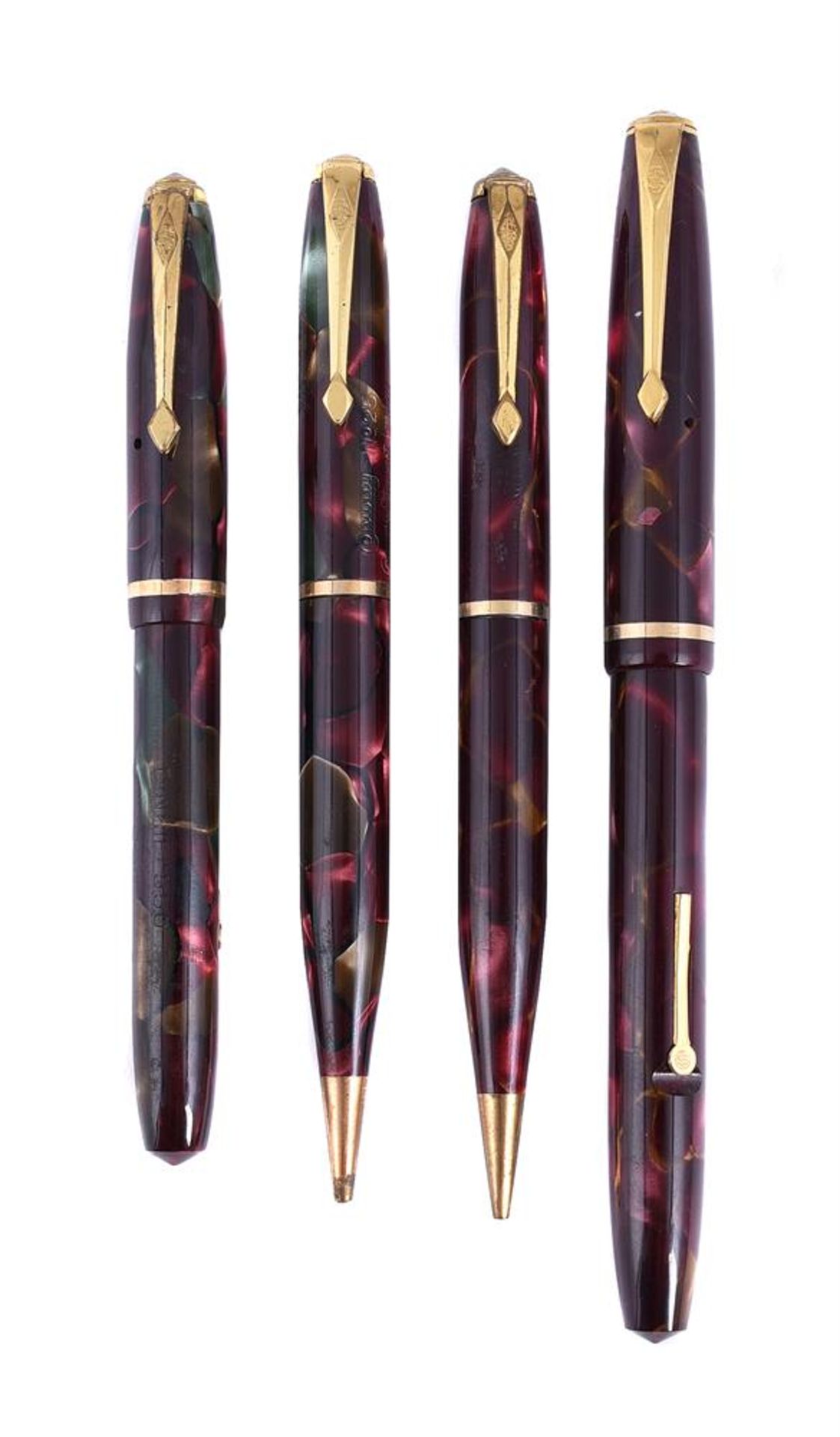 CONWAY STEWART, DINKIE 550, A RED MARBLED FOUNTAIN PEN AND PROPELLING PENCIL