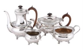 A VICTORIAN SILVER FOUR PIECE HALF LOBED OVAL TEA AND COFFEE SET