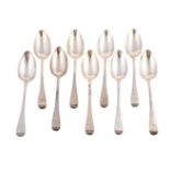 A SET OF NINE GEORGE III OLD ENGLISH PATTERN TABLE SPOONS